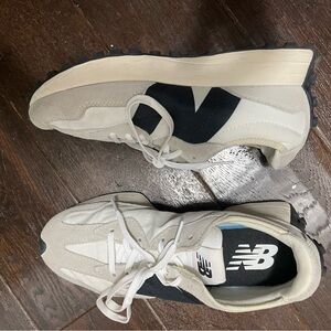 New Balance Beige and Black Sneakers